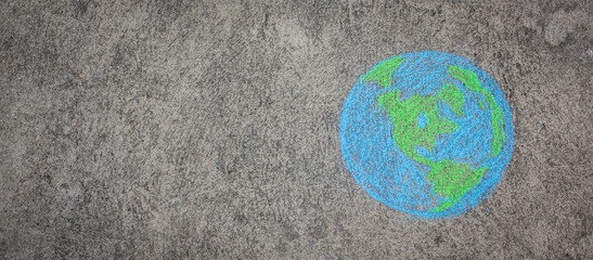 Closeup earth draw with chalk on the street wall. Background of world harmony green peace environment earth day together concept banner