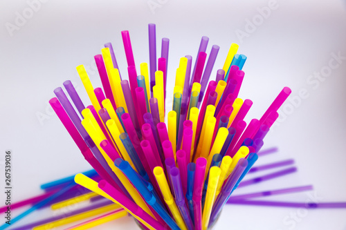 Set of colorful tubes for cocktails. Tubes are chaotic.