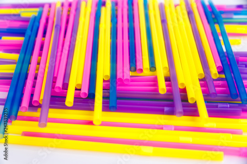 Set of colorful tubes for cocktails. Tubes are chaotic.