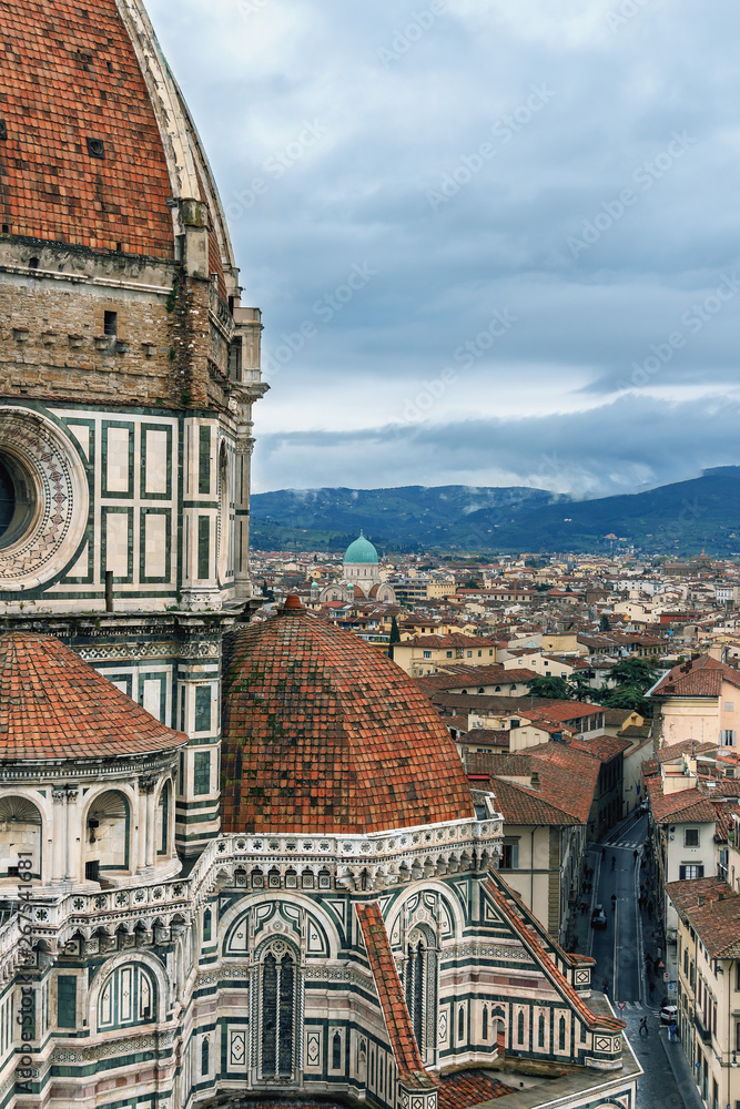 View of ancient Florence from the tower of the Cathedral of Santa Maria del Fiore on a cloudy spring day