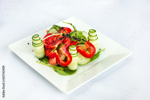 Fresh Tomato and Cucumber Salad with sweet bell pepper.