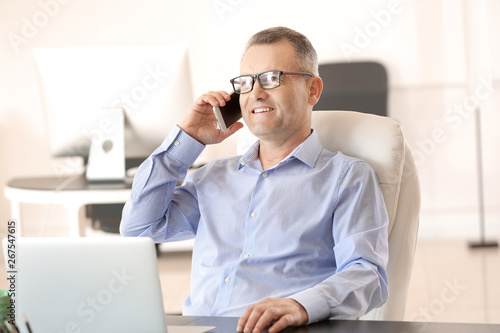 Handsome mature businessman...