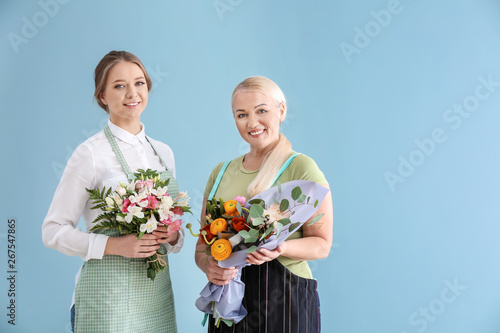 Female florists with bouque...