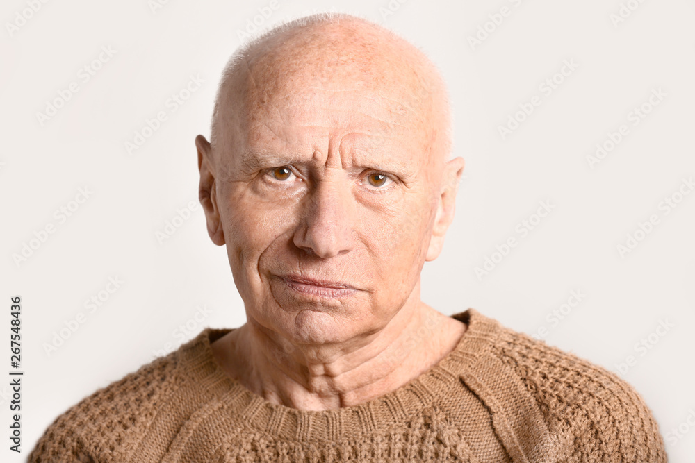 Obraz premium Portrait of senior man on white background