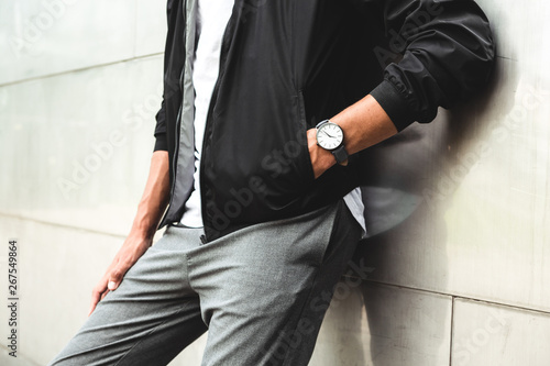 Young Man Wearing Analog Watch in the Urban environment