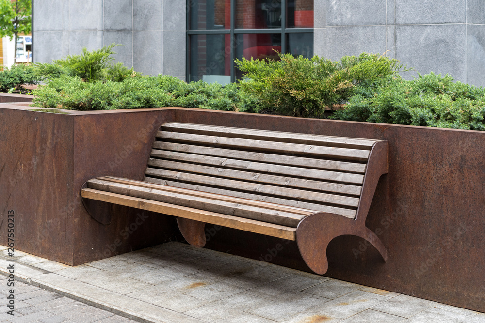 wooden bench outside the building