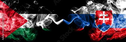 Palestine vs Slovakia, Slovakian smoky mystic flags placed side by side. Thick colored silky smokes flag of Palestinians and Slovakia, Slovakian photo