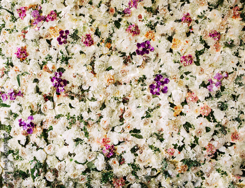 Flowers wall background for wedding with roses, orchids, hydrangeas and peonies. 