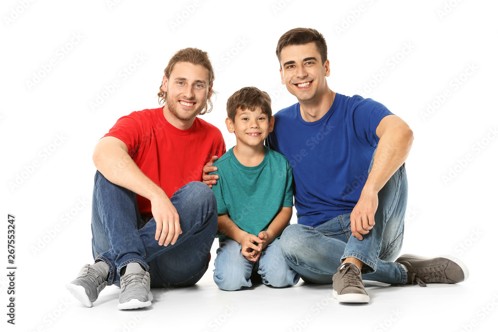 Happy gay couple with adopted child on white background Happy gay couple with adopted child on white background