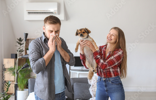 Woman with dog and her husb...