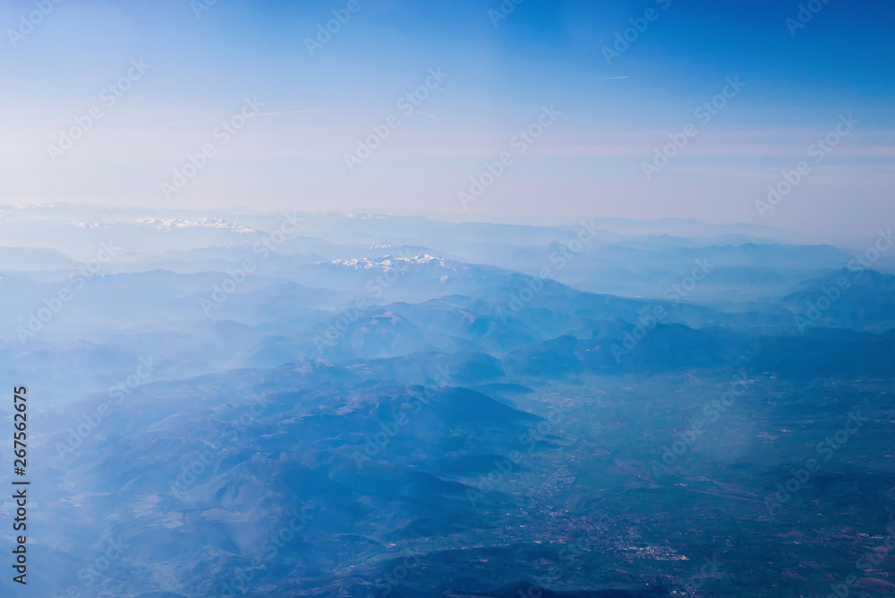 Mountain view from an airplane window. Mountain view from an airplane window.