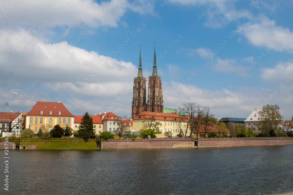 Panorama of the historical Polish city Wroclaw and reflection in the Odra River, Wroclaw Embankment.