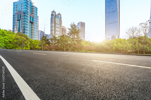 Shanghai modern commercial office buildings and empty asphalt highway