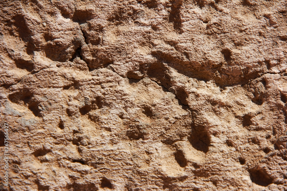 brown stone or mwith cracks and patternsarble wall a texture brown stone or mwith cracks and patternsarble wall a texture