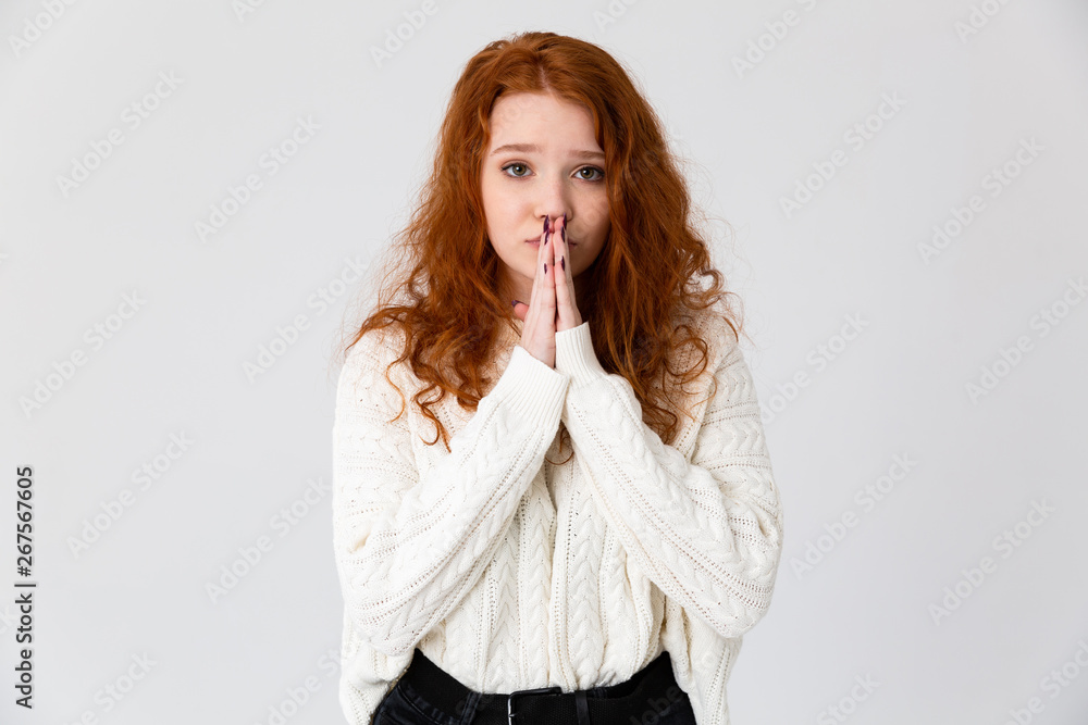 Portrait of a lovely young redheaded girl