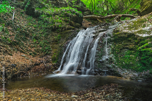 Fototapeta Naklejka Na Ścianę i Meble -  Beautiful waterfall deep in the forest.