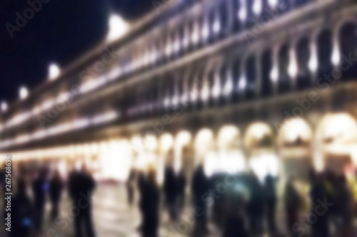Defocused background of St. Mark's Square at night, Venice, Italy.