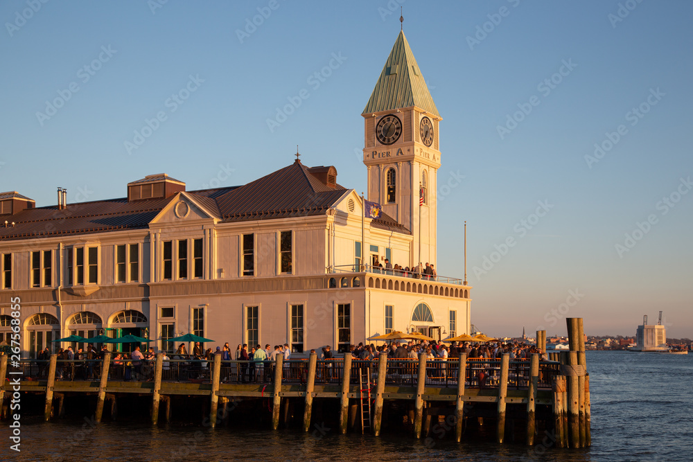 Obraz premium View of Pier A Harbor House / City Pier A / Liberty Getaway, a municipal pier in the Hudson River at Battery Park in Manhattan, FiDi, Downtown. 