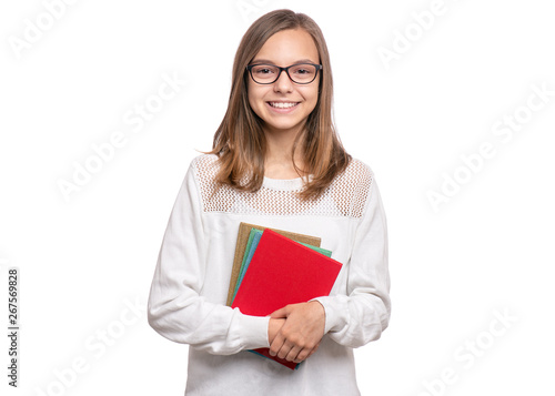Portrait of beautiful Teen Girl in Eyeglasses with Books. Portrait of School Teenager holding books, isolated on white background. Happy smiling college child looking at camera.