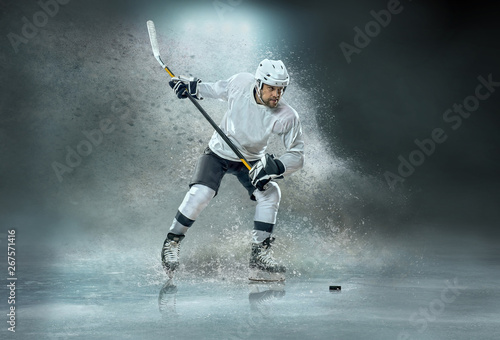 Caucassian ice hockey Players in dynamic action in a professiona © Andrii IURLOV