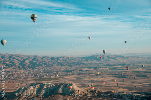 Cappadocia, Turkey November 13, 2016: Balloons with passengers in the sky early in the morning in a unique place Cappadocia