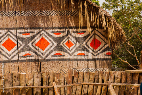Fényképezés Large house covered with sape grass, Indigenous tribe village near Manaus, Amazo