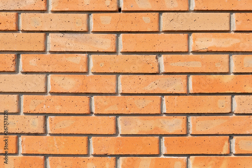 wall of new red brick, natural material, baked clay, close-up