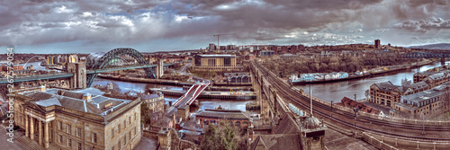 Panoramic landscape view of Newcastle upon Tyne & Gateshead shot in HDR on an overcast summer daytime from the castle keep