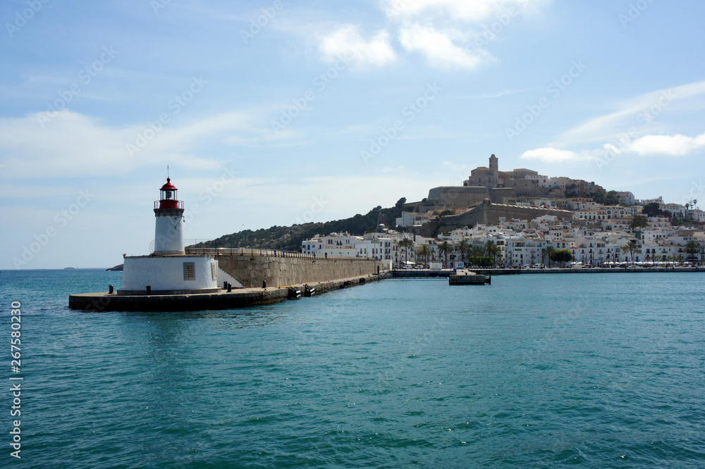 Lighthouse on the pier of Ibiza harbor.