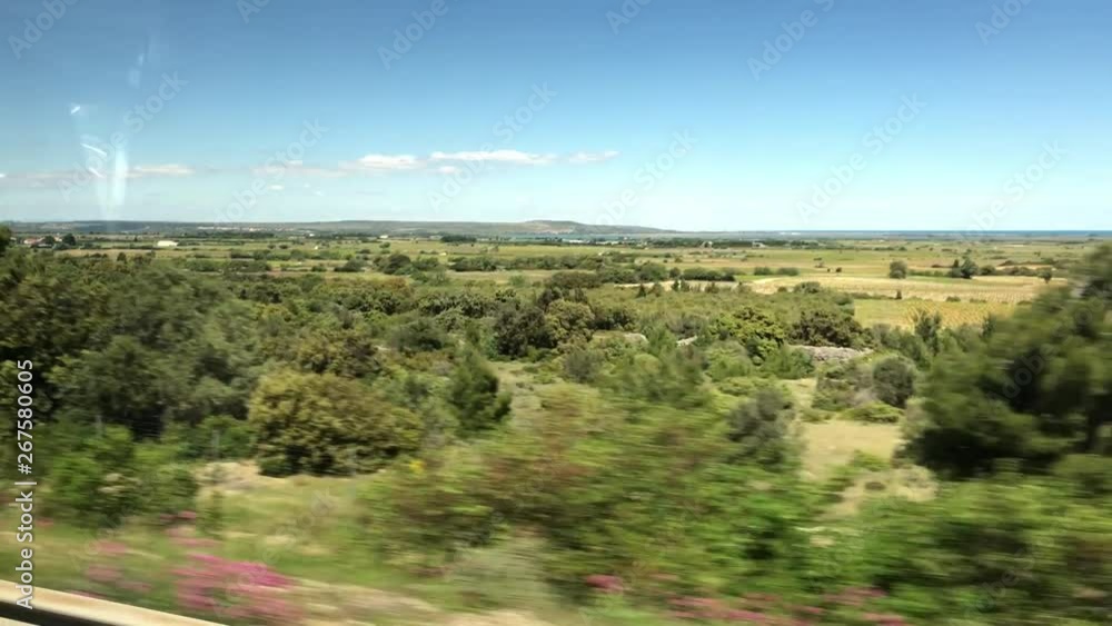 View from window of bus going through south France (Occitania). Barcelona - Leon bus View from window of bus going through south France (Occitania). Barcelona - Leon bus