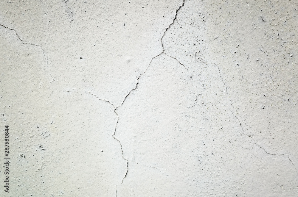 Fototapeta premium cracked and aged gray wall background