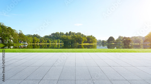 Fototapeta Naklejka Na Ścianę i Meble -  Empty street with comfortable and relaxation great garden , morning scene .