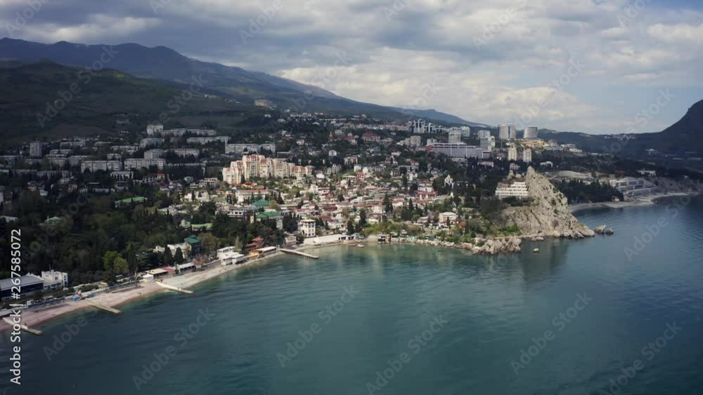 Aerial establishing shot, showing Meraba built on a hill, a small city on the Crimea. Aerial establishing shot, showing Meraba built on a hill, a small city on the Crimea.
