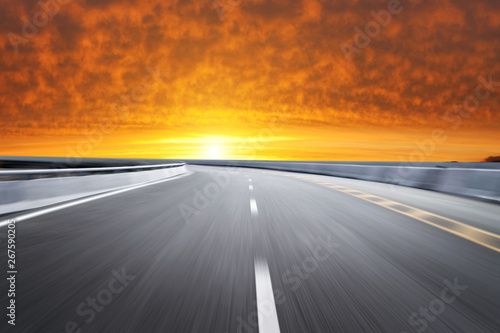 Motion-blurred highway in dusk clouds  © onlyyouqj