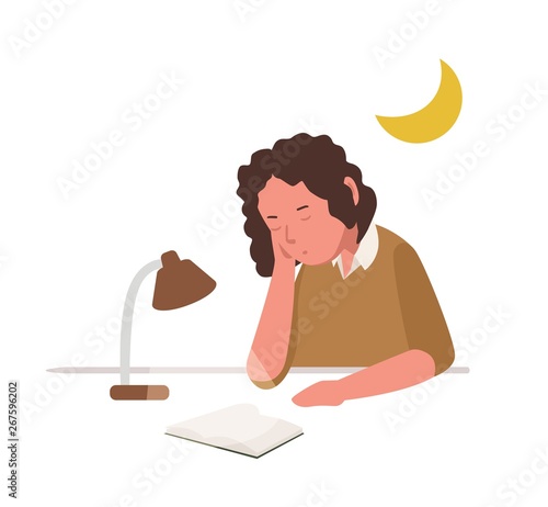 Young girl sleeping, slumbering or dozing while reading book or preparing for...