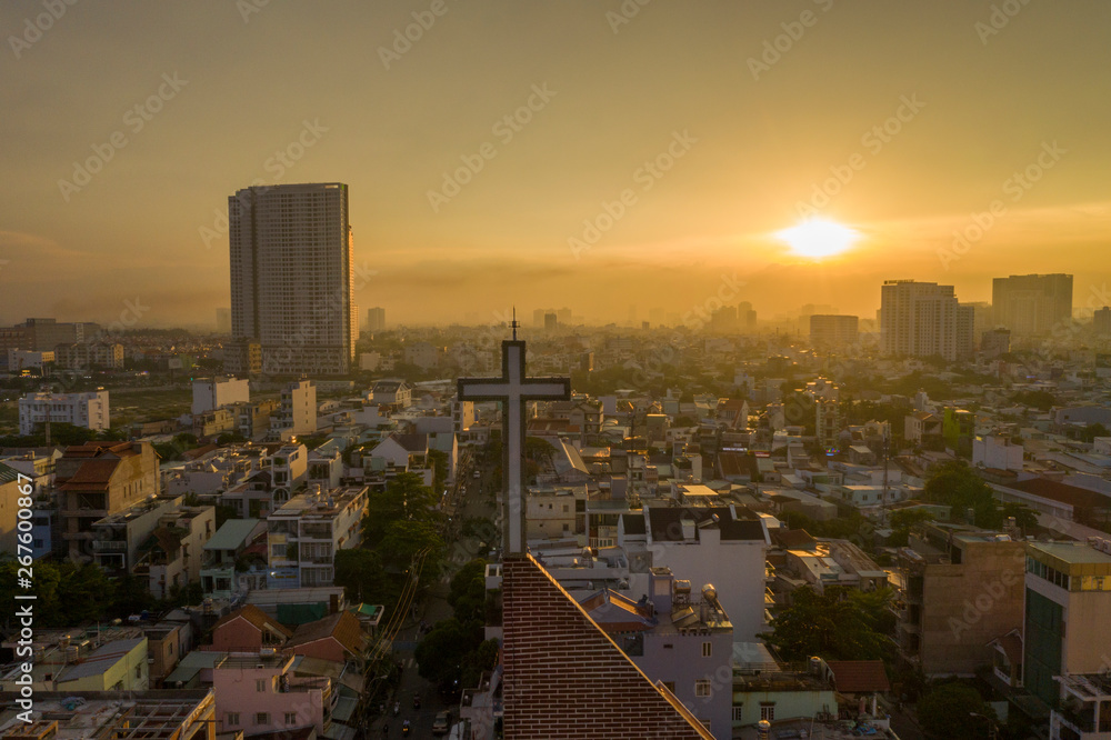 Obraz premium Modern Church Spire against City Scape Sunset