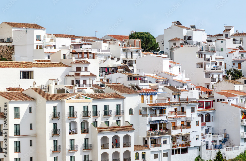 The White Mountain village of Frigiliana close to popular town of Nerja. Frigiliana is a beautiful typical Andalusian town that still keeps its Moorish structure. Province Malaga, Costa del Sol, Spain