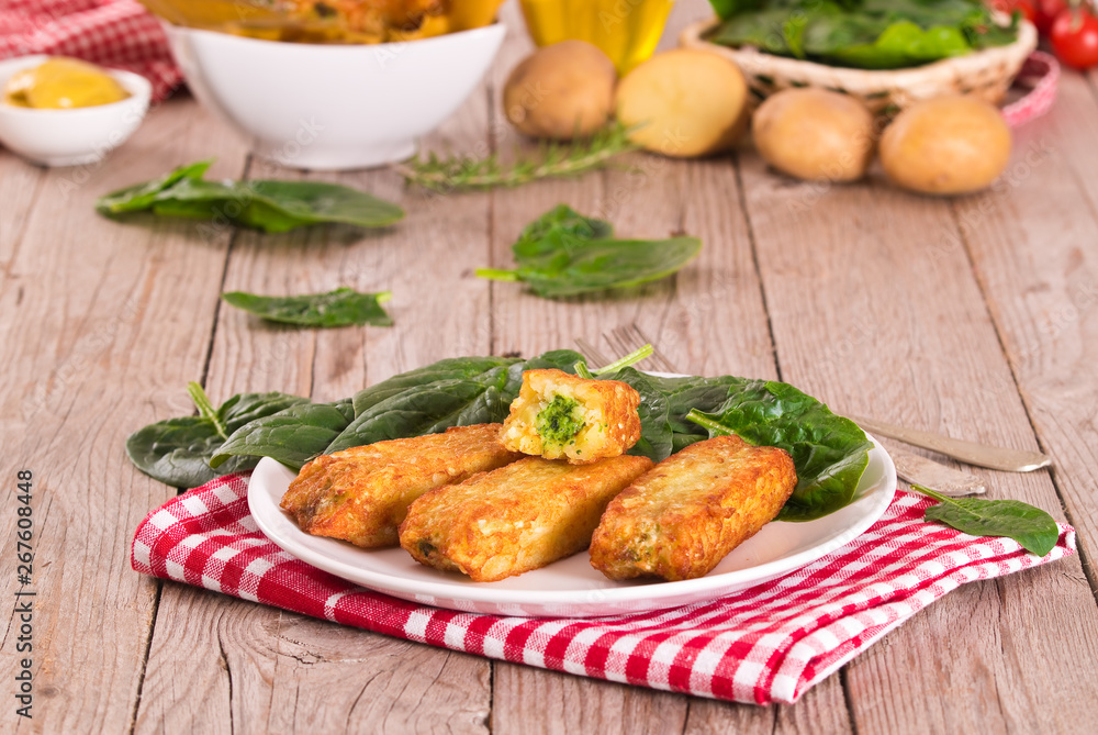 Potato croquettes with spinach and mozzarella. Potato croquettes with spinach and mozzarella.