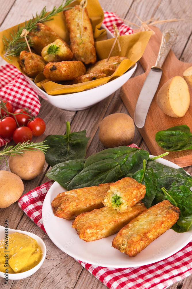 Potato croquettes with spinach and mozzarella. Potato croquettes with spinach and mozzarella.