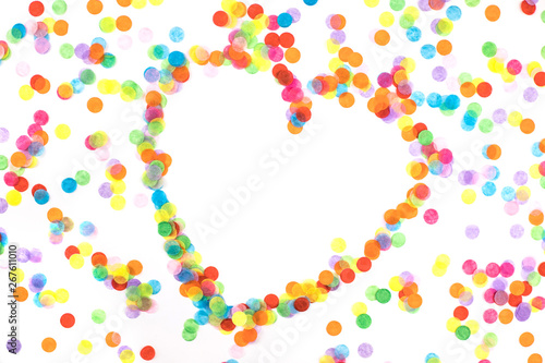 Bright multicolored confetti isolated on white background.