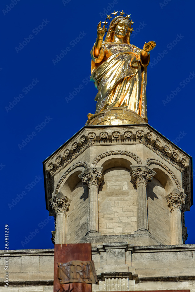 Gilded statue of Virgin Mary at Notre-Dame des Doms cathedral in Avignon, France