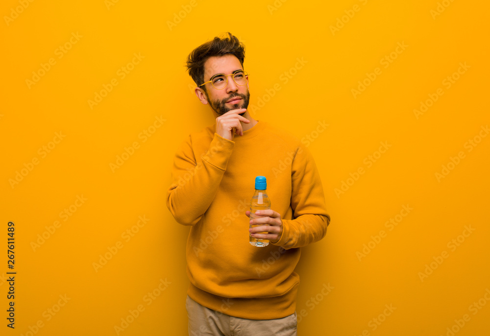 Young man thinking about an idea Young man thinking about an idea