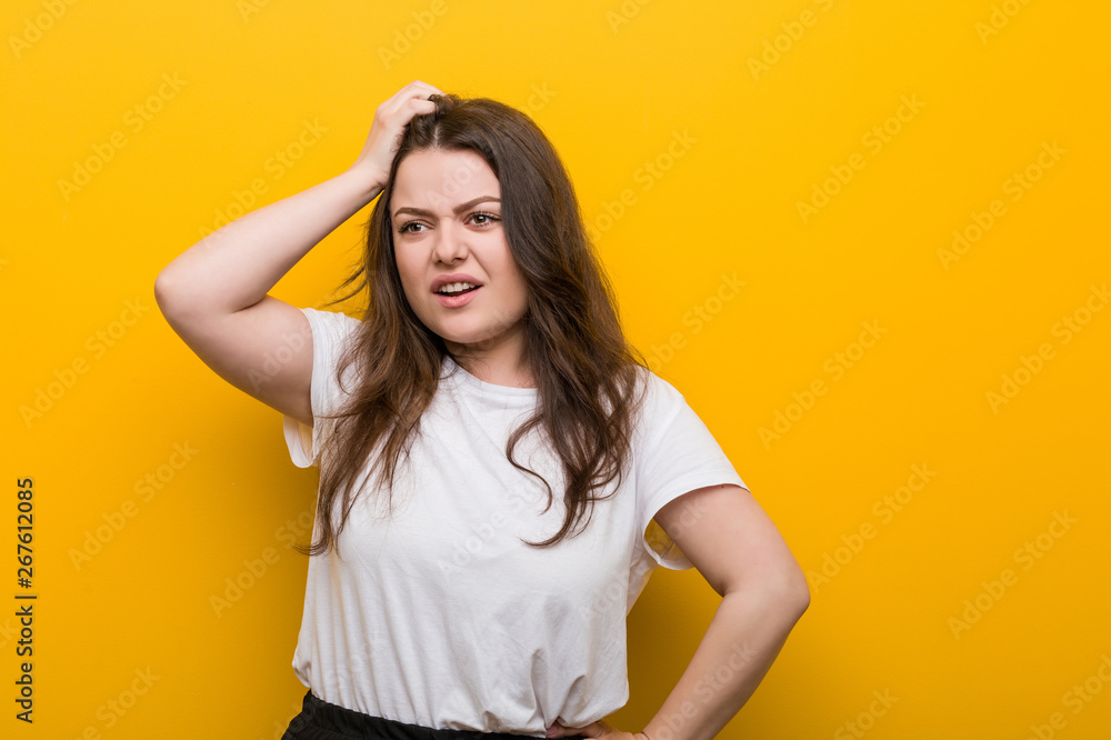 Young curvy plus size woman being shocked, he has remembered important meeting. - obrazy, fototapety, plakaty 