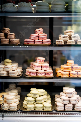 Colorful Macaroons. tasty French macaroon in the shop window. Dessert at pastry confectionary shop. Summer sweets
