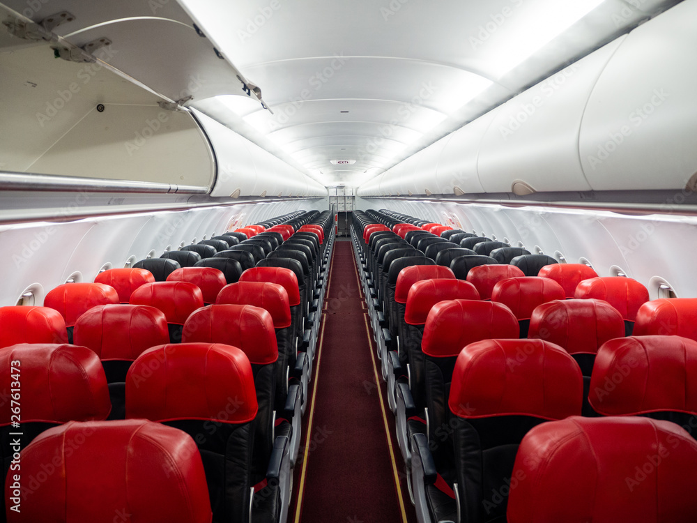 Fototapeta premium Inside of empty single aisle aircraft cabin, top angle