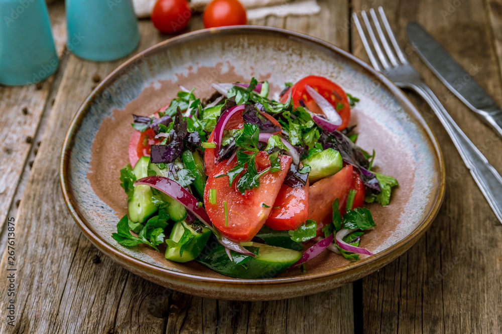 Vegetable salad with tomatoes and cucumbers