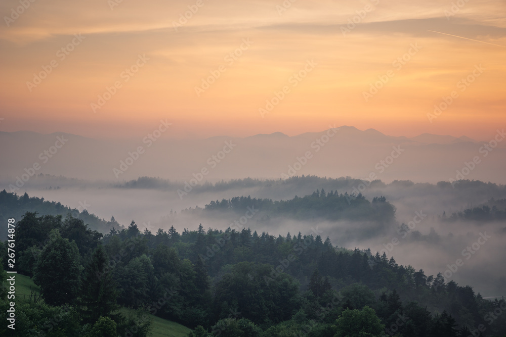 Foggy evening in Alps in Tunjice, Upper Carniola, Slovenia