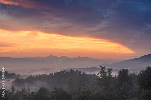 Sunset over the Alps on a foggy evening in Tunjice  Upper Carniola  Slovenia