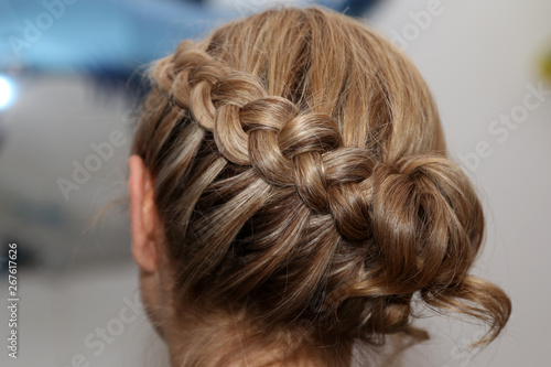 Portrait Of Beautiful Young Blond Woman With Braid Crown Hairstyle.