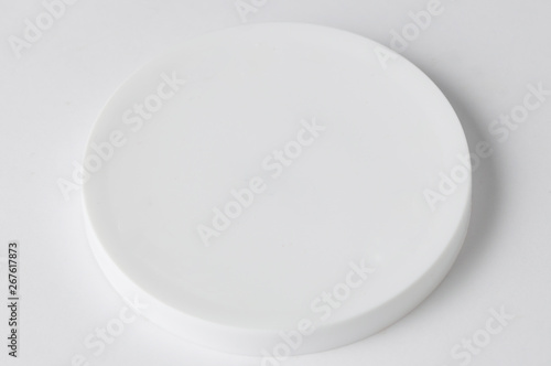 White plastic cover isolated on white background. Copy space